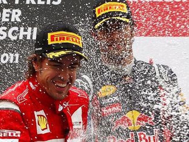 Fernando Alonso y Mark Webber, segundo y tercero en el Gran Premio de Alemania.

Foto: EFE