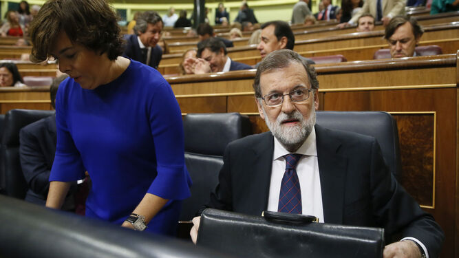 Sáenz de Santamaría junto a Mariano Rajoy.