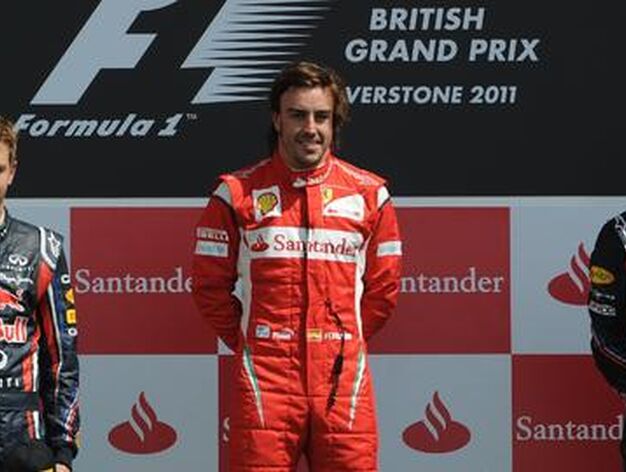 El podio del Gran Premio de Gran Breta&ntilde;a, con Fernando Alonso, primero; Sebastian Vettel, segundo; y Mark Webber, tercero.

Foto: AFP Photo