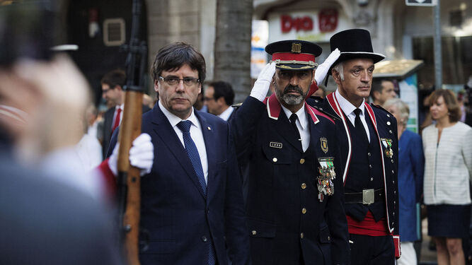 El ex president Puigdemont y el ex mayor de los Mossos, Josep Lluís Trapero.