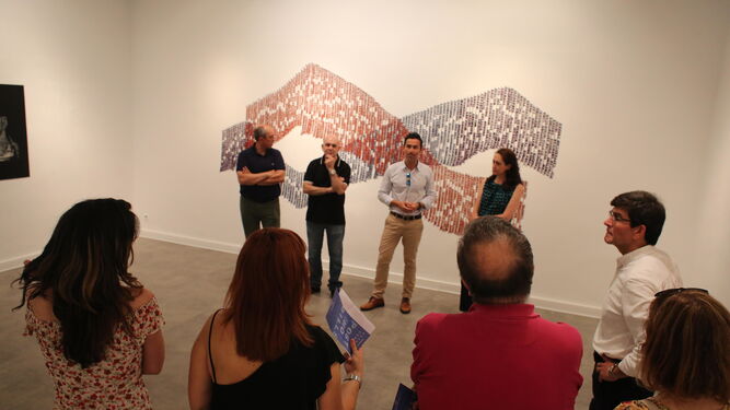 Distintos momentos del acto inaugural de la exposición en la Sala XXI del Museo de Huelva.