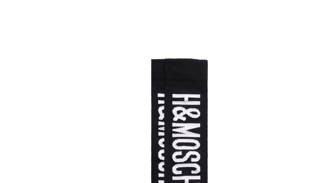 Calcetines altos negros de Moschino tv H&amp;M 19,99 EUR