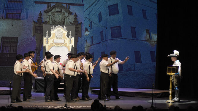 Los Jumeras interpretan un tema frente al pregonero del Carnaval de Córdoba 2019, Miguel Amate.