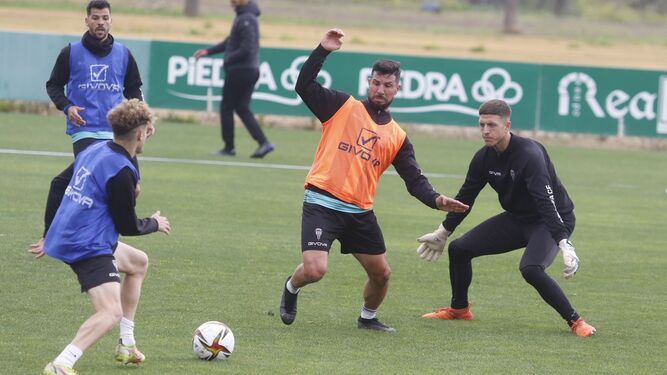 José Ruiz, Simo, Willy y Carlos Marín durante el entrenamiento del miércoles.