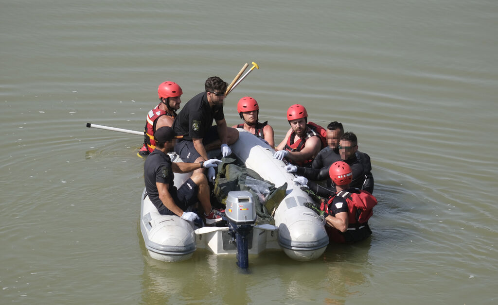As&iacute; ha sido el rescate del cuerpo del joven ahogado en el Guadalquivir