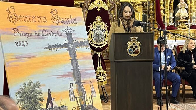 La pintora y artista prieguense Aurora García-Calabrés Ballesteros presenta el cartel.